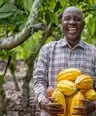 man holding cacao