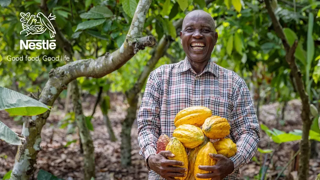 man holding cacao
